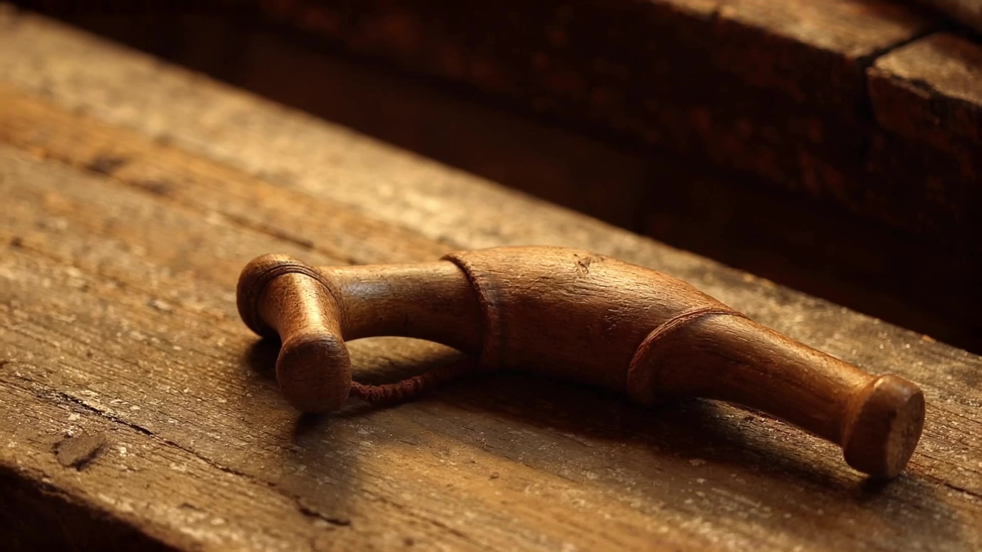 A Cinematic 30 Second Instructional Video On Crafting A Classic Wooden Slingshot. Shot 1 (0 5s): A Macro Close Up Of A F